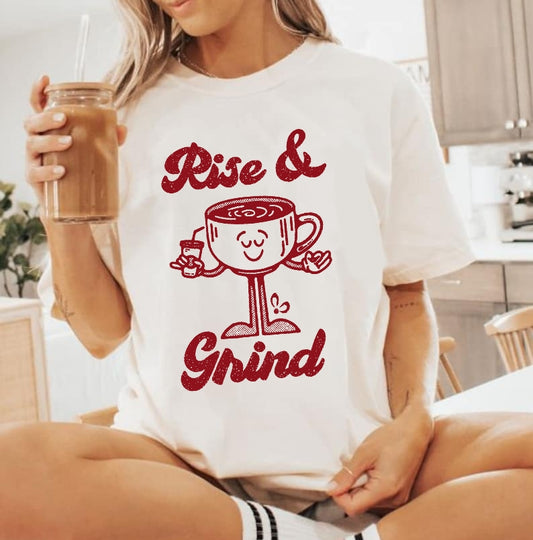 Girl holding iced coffe and wearing tshirt with rise and grind retro coffee print by bowie creations 